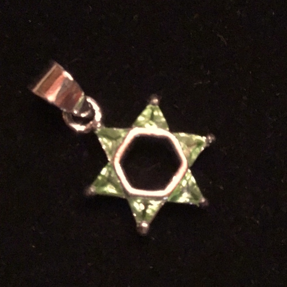 New Sterling Silver Star of David pendant set with light green CZ’s. 1/2” dia,